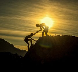 goal buddy climbing mountain