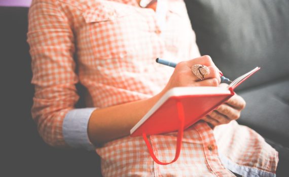 girl writing down her values